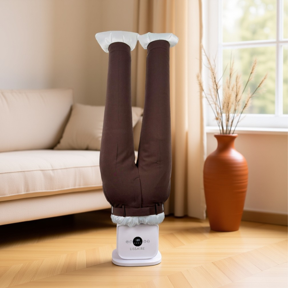 Automatic ironing machine pressing a pair of trousers on Lissaire